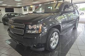 Image result for Black Granite 2012 Suburban