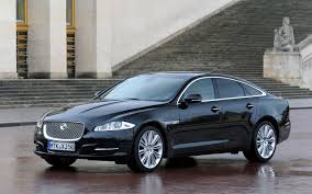 The classic jaguar logo that has become a symbol of the british car maker is a jumping feline above the company's name. Black Jaguar Xf Hd Wallpapers 1080p