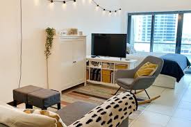 Creative Storage Solutions And Lots Of Ikea Help Two People Share A 450 Square Foot Studio In 2020 Creative Storage Solutions Apartment Decor Creative Storage