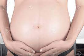 Pregnant Woman Seven Month In Black Bikini Front View Closeup Stock Photo Picture And Royalty Free Image Image 75417489