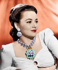 Old Hollywood glamour...Olivia de Havilland at the 1947 Academy Awards.