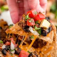Make the pico de gallo by mixing together 1/2 of the chopped onion, 3 roma tomatoes, jalapeno, cilantro, lime juice, and salt. Best Loaded Nachos So Many Delicious Layers Lil Luna