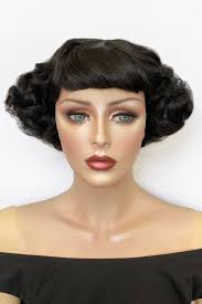A short black vintage style wig with finger waves: Marlene