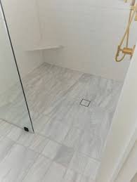 The hydro ban linear drain allows for the use of large format tile or stone installations in a shower with a single plane slope to the drain. Using Large Format Tiles On Shower Floor Yes Or No