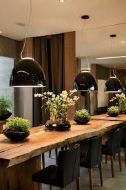 A Dining Table Made Of Raw Edged Wood With Black Chairs Modern Lighting V Ev Ic Mekanlari Dekor Oda Dekoru