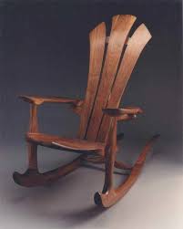 These Adirondack Chair Plans Will Help You Build An Outdoor Furniture Set That Becomes The Centerpiece Rocking Chair Plans Diy Rocking Chair Wood Rocking Chair