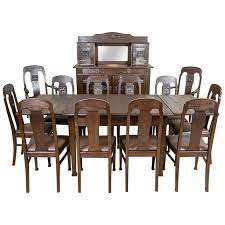 We offer a great selection of brand name furniture at exceptionally affordable prices by eliminating expensive showroom overhead. Art Nouveau Oak Dining Room Set Circa 1910 1920 For Sale At 1stdibs