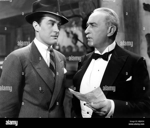 BULLDOG DRUMMOND ESCAPES, Ray Milland, Sir Guy Standing, 1937 Stock Photo -  Alamy