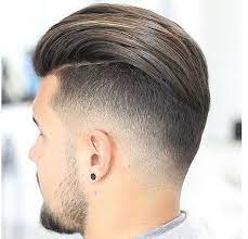 La Coiffure Slicked Back Undercut Coupe De Cheveux Homme Coiffure Homme Coupe De Cheveux Coupe Cheveux Homme