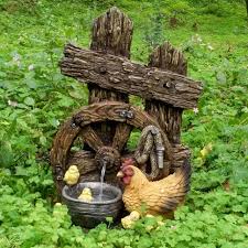 Sie beleben den garten durch plätschernde geräusche und durch einen frischen verdunstungseffekt. Aussen Zier Spring Brunnen Holz Deko Kaskade Rad Huhn Optik Garten Pumpe Harms 318816 Etc Shop