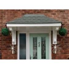 The front door cannot be moved due to the basement stairs.the peak of the gable and the front door will be off. Grp Door Canopy
