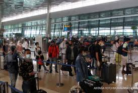Protokol kesehatan di lingkungan kerja pt. Libur Pergerakan Penumpang Bandara Soetta Capai Rekor Tertinggi Selama Pandemi