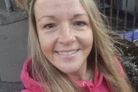 Woman, 42, and dog die after being hit by car