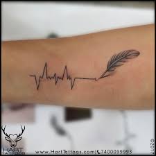 Heartbeat tattoo for girls is quite simple to design yet very popular and amazing. Heartbeat Feather Tattoo Design For Girls Tattoo Designs For Girls Heartbeat Tattoo Small Tattoos For Guys
