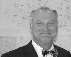 Message from President Fr. James Murphy, CSB This weekend the expanded St.  Thomas High School community has seen the passing of two beloved alumni.  The Most Reverend Vincent M. Rizzotto '49, retired