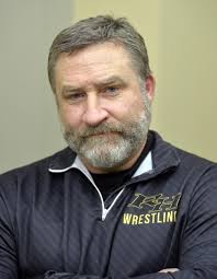 High school wrestling programs grapple with competing during COVID-19
