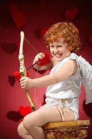 In greek mythology, he is known as eros, and, depending on the source, was thought to be a primordial god who came into the world either asexually, from an egg, or the son of aphrodite (venus' hellenistic counterpart). With V Day In View Cupid Works On Aiming Its Arrows At The Hearts Of Lonely Singles