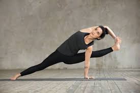 Download Young Woman Doing Visvamitrasana Exercise For Free Exercise Women Young