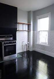 Kitchen flooring flooring kitchens painting tips and hacks if you're looking for an affordable and stylish way to spruce up your kitchen, try painting your hardwood floor. Installing A Plywood Plank Kitchen Floor Part Two Black Wood Floors Painted Wood Floors Kitchen Flooring