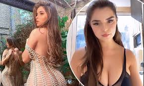 Demi Rose bares her VERY peachy posterior in beige cut-out dress | Daily  Mail Online