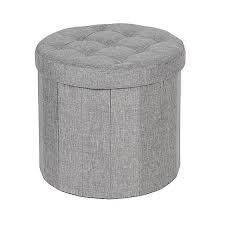 Use it in a living room or family room to contain controllers, remotes curvy and cuddly, our calder ottoman embraces with sculptural style and a white vegan sheepskin that rivals the look and feel of the real thing. Round Grey Shoe Storage Ottoman Dunelm
