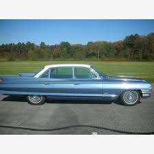 Image result for Platinum Gray 1961 Cadillac