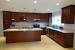 White Quartz Countertops With Dark Cabinets