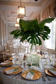 Giant Palm Leaves As Centerpiece Dramatic Yet Cost Effective And Easy To Create Tropical Centerpieces Greenery Wedding Decor Greenery Wedding Centerpieces