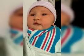 Holzer family welcomes Regina's first baby of 2021