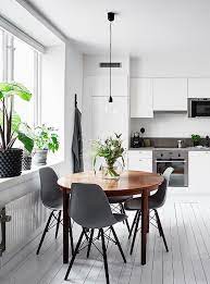 White Kitchen With A Round Dining Table Coco Lapine Design Dining Room Small Scandinavian Dining Room Minimalist Dining Room