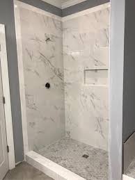 Maybe you would like to learn more about one of these? Home Decorators Collection Carrara Polished 12 In X 24 In Polished Porcelain Floor And Wall Tile 16 Sq Ft Case Nhdcarr1224p The Home Depot Bathrooms Remodel Bathroom Remodel Designs Bathroom Tile Designs
