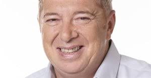 Roland Gaspar hands afternoon Drive Show mic to Sam Ludidi