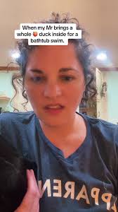 Guy in Bathtub with Ducks