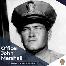 Today, we come together to remember and honor Newport Beach Police Officer  John Marshall, a dedicated public servant whose bravery and sacrifice have  left a mark