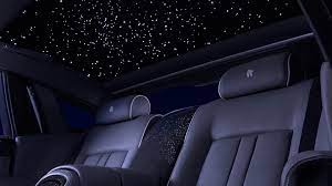 Keeping your feet flat on the floor, squat down so the ball rolls up your back, until your quads are just past parallel to the floor. Celestial Craftsmanship