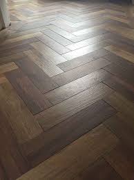 Dark Wood Effect Porcelain Floor Tiles Laid In A Herringbone Pattern Bathroom Floor Tiles W Wood Effect Floor Tiles Floor Tile Design Flooring
