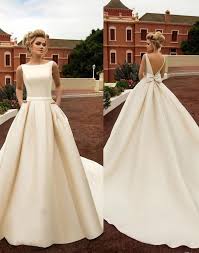 Onlybridals 2020 New Elegant Satin Beach Wedding Dresses With Pockets Backless Bow Boho Beach A Line Backless Wedding Dress Bridal Gowns In 2020 Backless Wedding Dress Boho Chic Wedding Dress Wedding