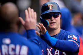Texas Rangers place DH Joc Pederson on injured list with broken hand | AP  News