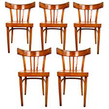 Looking for new wooden dining chairs? Set Of 5 Wooden Dining Chairs Made By Kok For Sale At 1stdibs