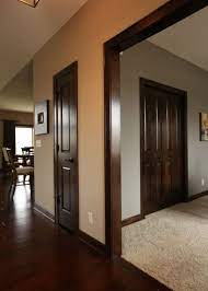 The 7 Best Neutral Paint Colours To Update Dark Wood Trim Kylie M Interiors Dark Wood Trim Wood Doors Interior Best Neutral Paint Colors