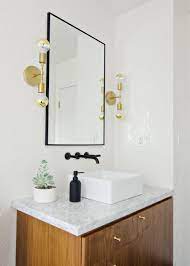Black White Walnut Bathroom With Black Faucet Brass Sconces Brittanymakes Bathroom Mirror Trends Bathroom Wall Sconces Bathroom Sconce Lighting