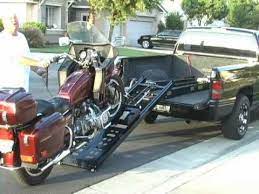 The Rampage Power Lift Motorcycle Ramp Is A Great Alternative To The Normal Motorcycle Loading Ramp Method Motorcycle Ramp Motorcycle Loading Ramp Bike Lift