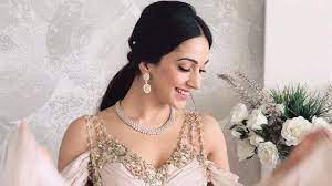 From The Beauty Books Of Stars Like Deepika Padukone Anushka Sharma And Karisma Kapoor These Bridal Hairstyles Deser Beauty Book Sleek Hairstyles Bridal Hair