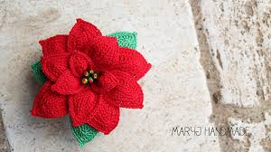 This garden of flower knitting patterns can be used for all sorts of knitting projects: Beautiful Crochet Poinsettia Christmas Crochet Patterns Crochet Flowers Crochet Flower Tutorial
