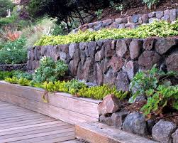 Put down a layer of capstone blocks to complete your retaining wall and enhance the overall aesthetic. 79 Ideas To Build A Retaining Garden Wall Slope Protection Interior Design Ideas Ofdesign