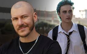 Jacked Courtney Act hits the gym and serves both Barbie and Ken