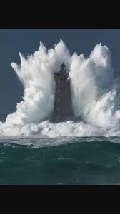 Lighthouse of la jument and the guard theodore malgorne, in the storm. La Jument Lighthouse France Natureisfuckinglit