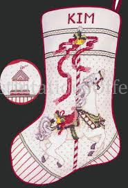 A haunted carousel horse might just scare you enough to stay home on halloween and stitch this whimsical design. Rare Evans Christmas Carousel Horse Crossstitch Stocking Kit