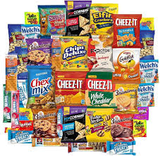 A Delicious Bundle Of Snacks Like Cookies Chips And Candy To Satisfy Your Craving For A Midnight Snack Or Multiple Midnight Snacks Snack Gift Snacks Healthy Candy
