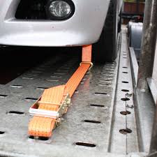 Wheel tie downs for car trailer. Car Trailer Over Wheel Ratchet Strap